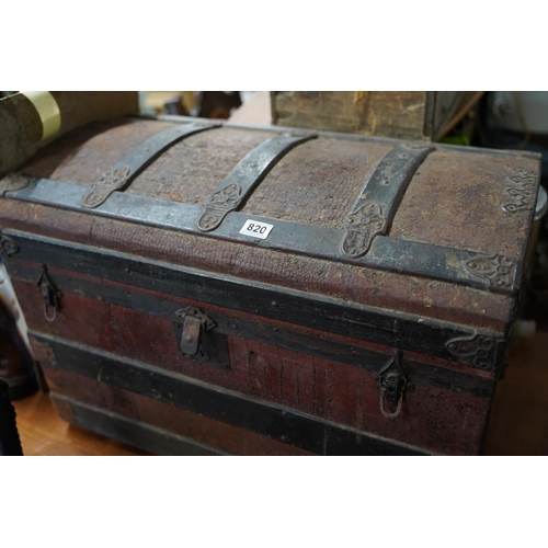 820 - An antique dome topped trunk, measuring 77x53x45cm.