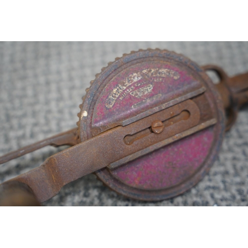 821 - A large antique carpenters brace drill.