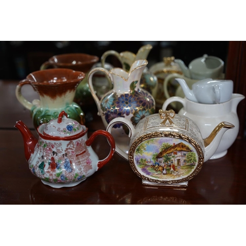 822 - A vintage German pottery vase, a vintage Sadler teapot, a J Fryer Olccourt Ware jug and more.