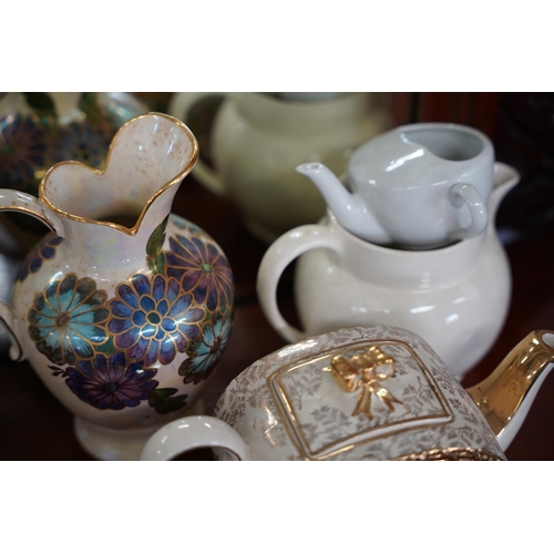 822 - A vintage German pottery vase, a vintage Sadler teapot, a J Fryer Olccourt Ware jug and more.