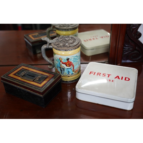 836 - A vintage metal First Aid tin, a Gaudeamus igitur tin tankard and more.