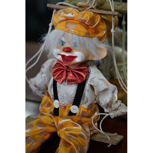 837 - A porcelain faced clown.