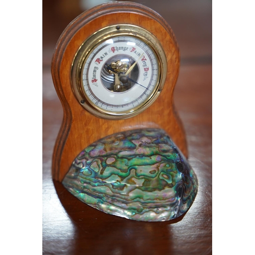 884 - A stunning vintage Ataahua Abalone shell and wooden cased barometer.