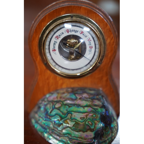 884 - A stunning vintage Ataahua Abalone shell and wooden cased barometer.