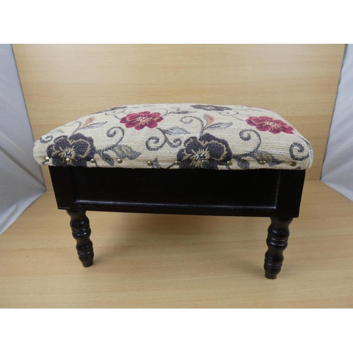 932 - An upholstered lift top footstool.