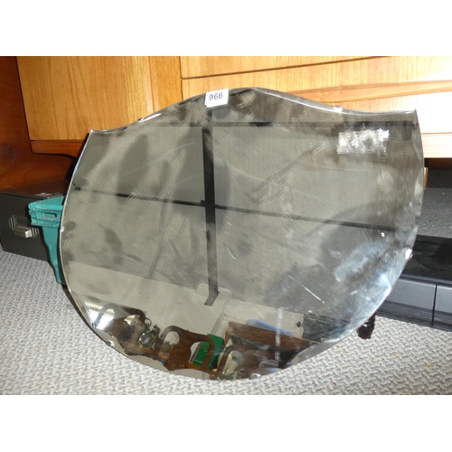 966 - A vintage frameless mirror, measuring 60x46cm.