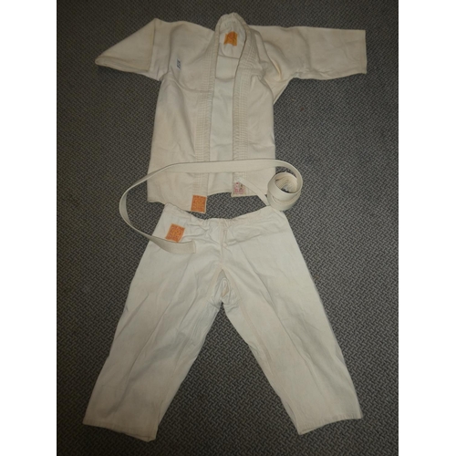 972 - A Karate jacket, trousers and belt.