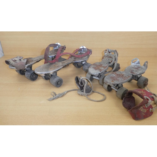 973 - A lot of vintage metal roller skates.