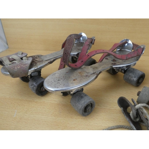 973 - A lot of vintage metal roller skates.