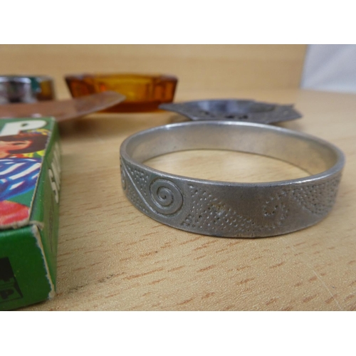 988 - A metal bangle, ashtrays and more.