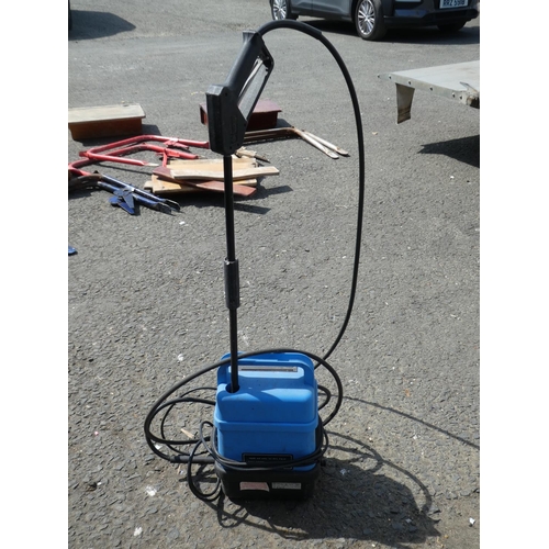 1086 - An electric power washer.