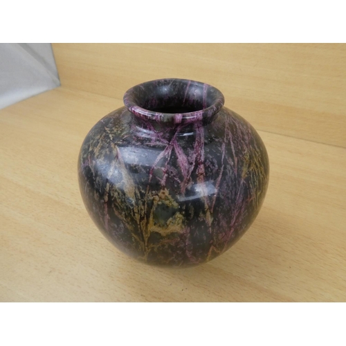 16 - A stunning patterned glass vase.