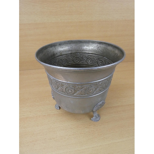 35 - A vintage metal planter, Measuring 17cm in height.