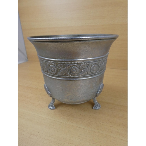 35 - A vintage metal planter, Measuring 17cm in height.