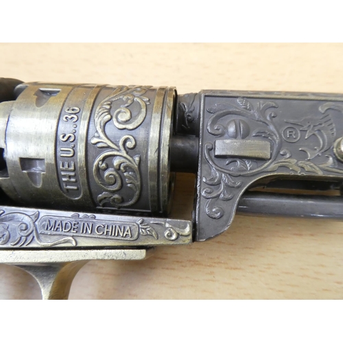 40 - A replica 'The US .36' colt revolver on stand.