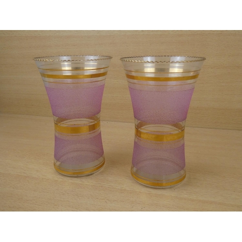 45 - A pair of stunning antique striped glass vases. 18x11cm.