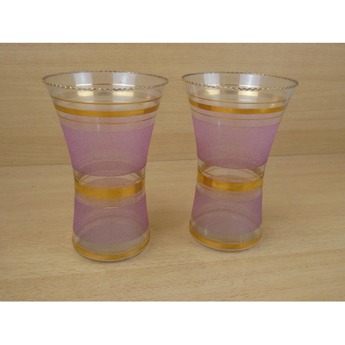 45 - A pair of stunning antique striped glass vases. 18x11cm.