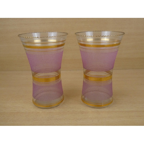 45 - A pair of stunning antique striped glass vases. 18x11cm.