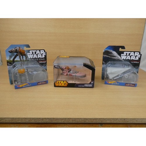 5 - A boxed Star Wares 'Star Destroyer', a boxed Star Wars Rogue One 'Imperial At-Act Cargon Walker' and... 