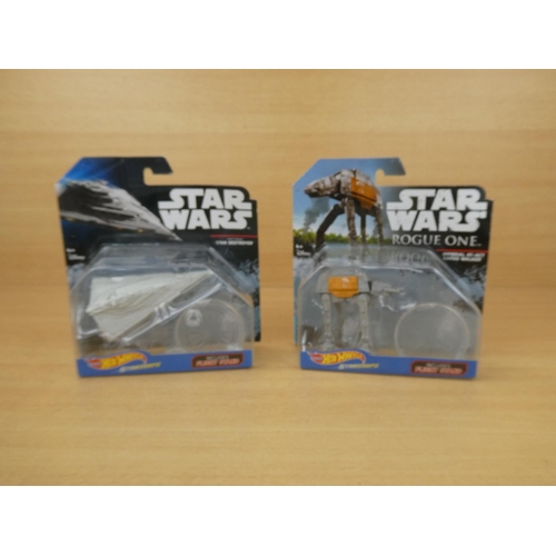 5 - A boxed Star Wares 'Star Destroyer', a boxed Star Wars Rogue One 'Imperial At-Act Cargon Walker' and... 