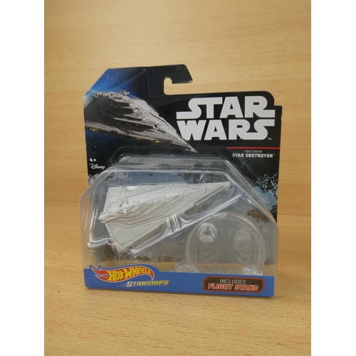 5 - A boxed Star Wares 'Star Destroyer', a boxed Star Wars Rogue One 'Imperial At-Act Cargon Walker' and... 