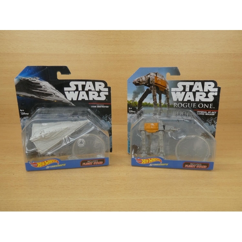 5 - A boxed Star Wares 'Star Destroyer', a boxed Star Wars Rogue One 'Imperial At-Act Cargon Walker' and... 