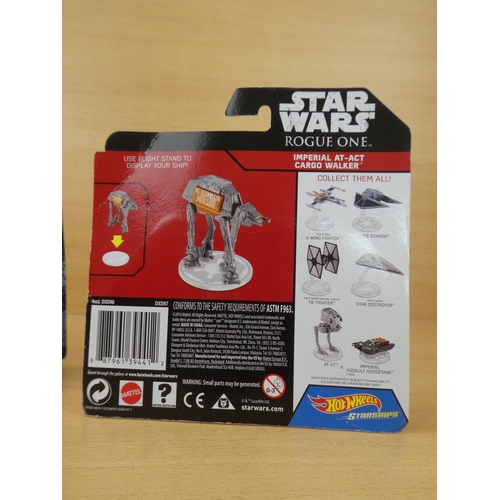 5 - A boxed Star Wares 'Star Destroyer', a boxed Star Wars Rogue One 'Imperial At-Act Cargon Walker' and... 