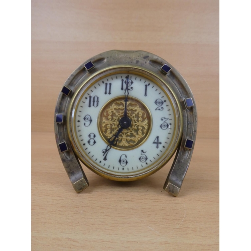 8 - A stunning antique brass & enamel clock, in the style of a horse shoe.