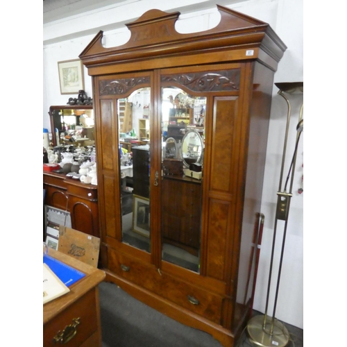 87 - A stunning antique mahogany and walnut two door wardrobe with mirror panels, measuring 150x230x52cm.