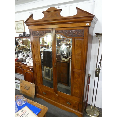 87 - A stunning antique mahogany and walnut two door wardrobe with mirror panels, measuring 150x230x52cm.