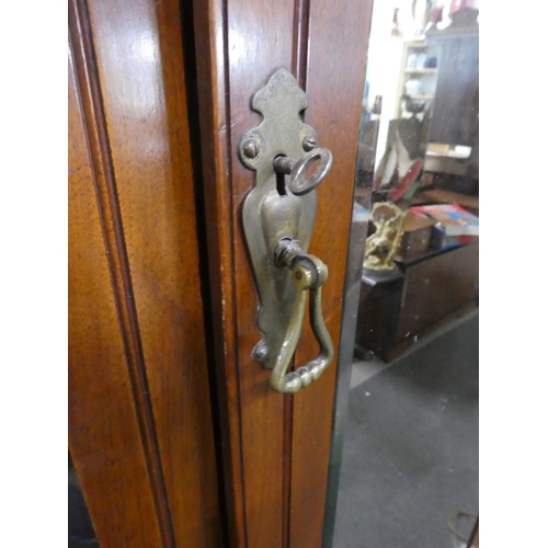 87 - A stunning antique mahogany and walnut two door wardrobe with mirror panels, measuring 150x230x52cm.