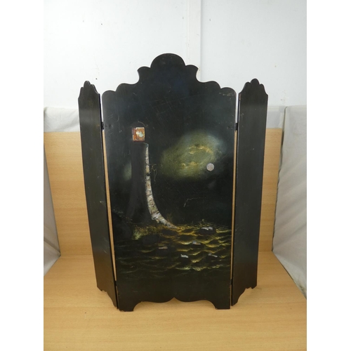 88 - An antique hand painted fire screen in the style of a lighthouse, measuring 61x70cm.