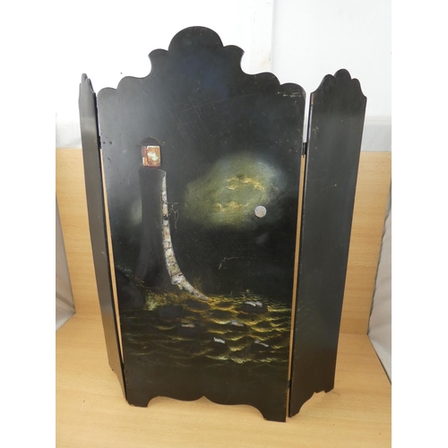 88 - An antique hand painted fire screen in the style of a lighthouse, measuring 61x70cm.