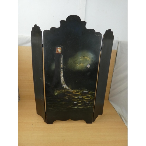 88 - An antique hand painted fire screen in the style of a lighthouse, measuring 61x70cm.