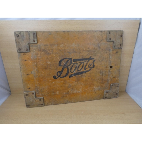 90 - A vintage 'Boots' wooden crate panel, measuring 62x45cm.