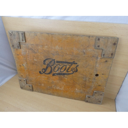 90 - A vintage 'Boots' wooden crate panel, measuring 62x45cm.