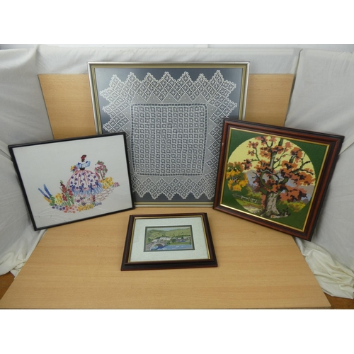 92 - A framed piece of Irish lace & 3 needlepoints, largest measuring 54x55cm.