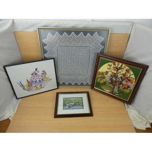 92 - A framed piece of Irish lace & 3 needlepoints, largest measuring 54x55cm.