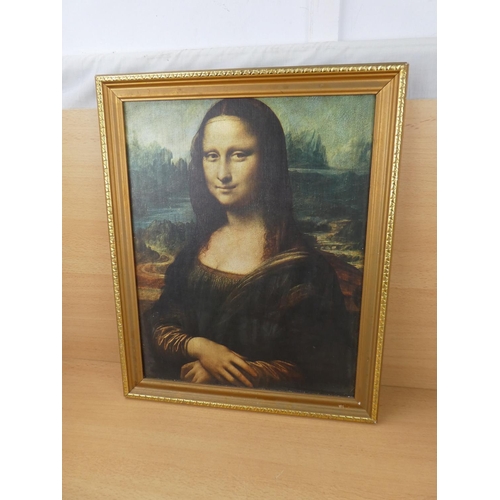 93 - A vintage framed print of the Mona Lisa.