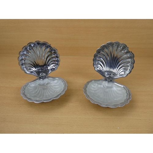 95 - A pair of vintage silver plated and glass preserve dishes.