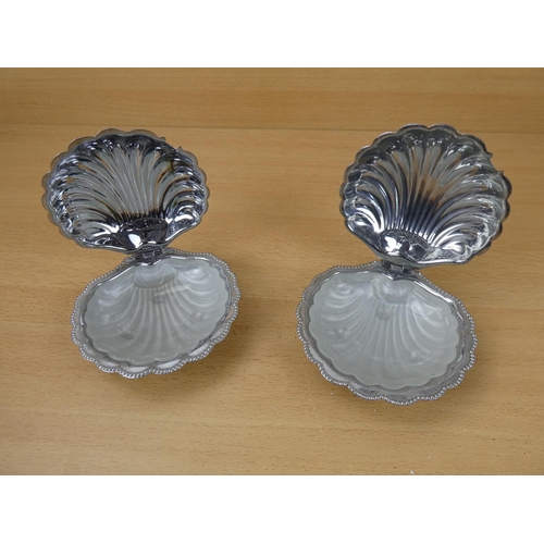 95 - A pair of vintage silver plated and glass preserve dishes.