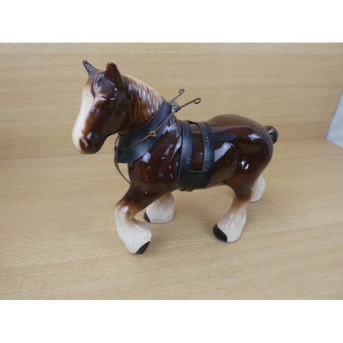 97 - A ceramic Clydesdale horse.