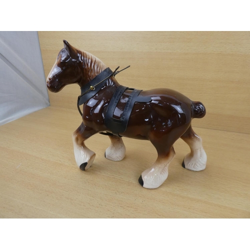 97 - A ceramic Clydesdale horse.