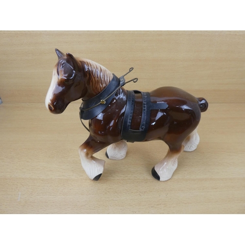 97 - A ceramic Clydesdale horse.