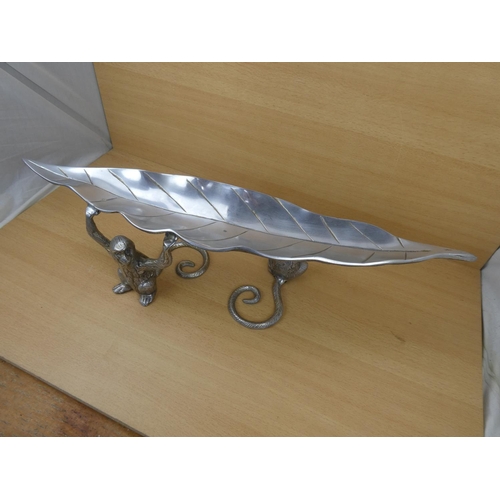 99 - An unusual metal centre piece, measuring 70cm in length.