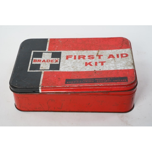 105 - A vintage first aid tin and contents.