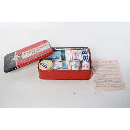 105 - A vintage first aid tin and contents.