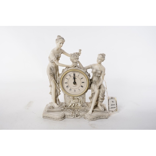 108 - A Juliana Collection figurine mantle clock.