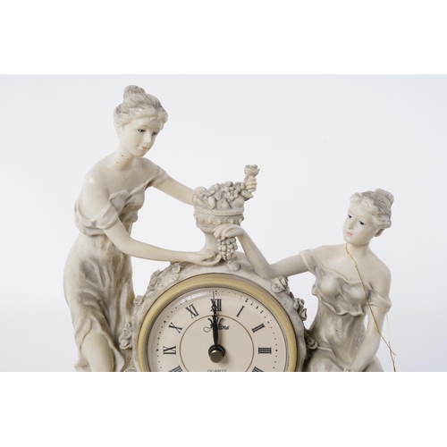 108 - A Juliana Collection figurine mantle clock.