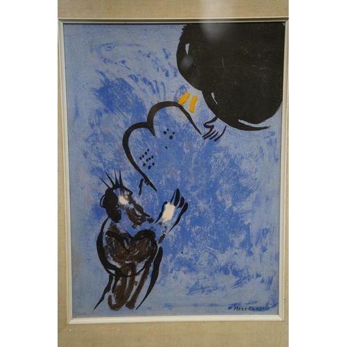 125 - A framed limited edition print 'Moses received the Tablets of Law' by Marc Chagall, measuring 24x34c... 